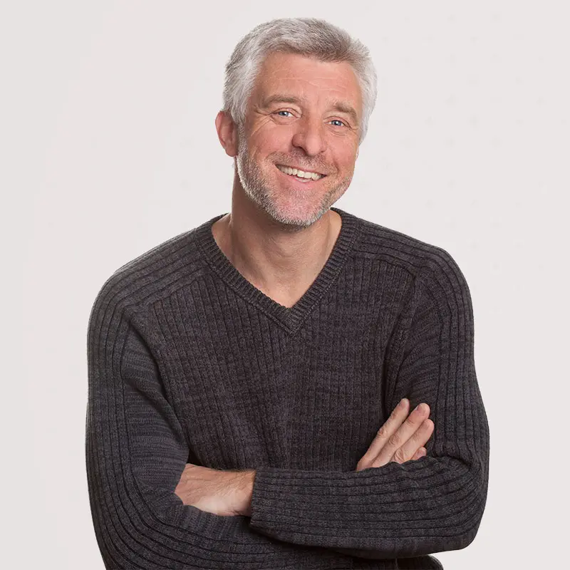 The Tummy Team - Diastasis Recti And Pelvic Floor Healing 1 Smiling middle-aged man after successful core strength recovery with The Tummy Team’s functional core rehab program.