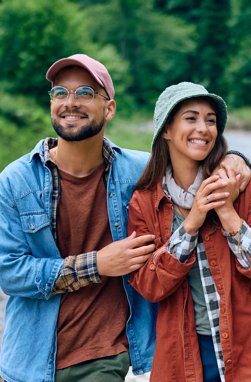 The Tummy Team - Diastasis Recti And Pelvic Floor Healing 5 Smiling man and woman outdoors, representing emotional wellness and support during core rehabilitation for diastasis recti in men.